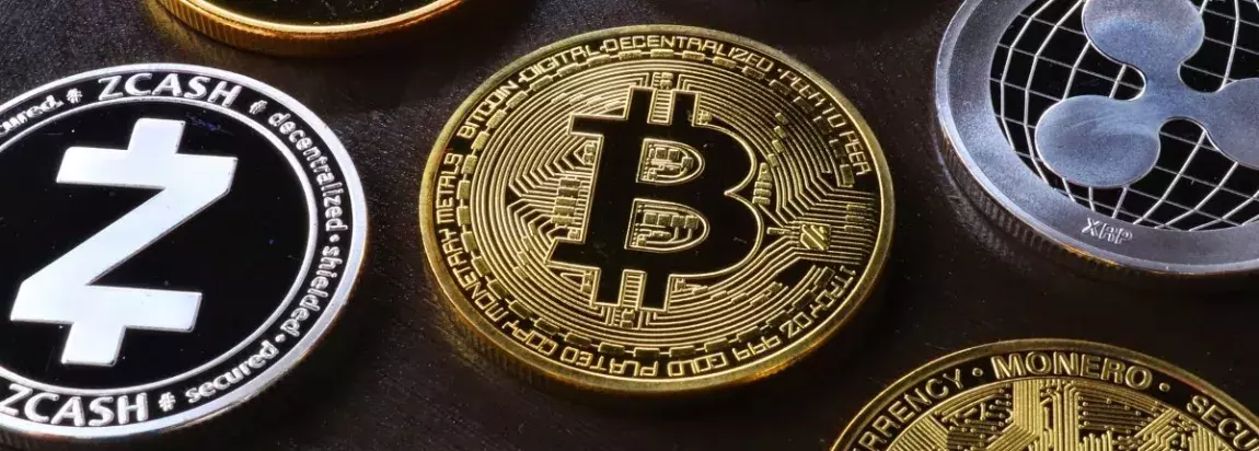 piece de monnaie avec un B inscrit cryptomonnaie